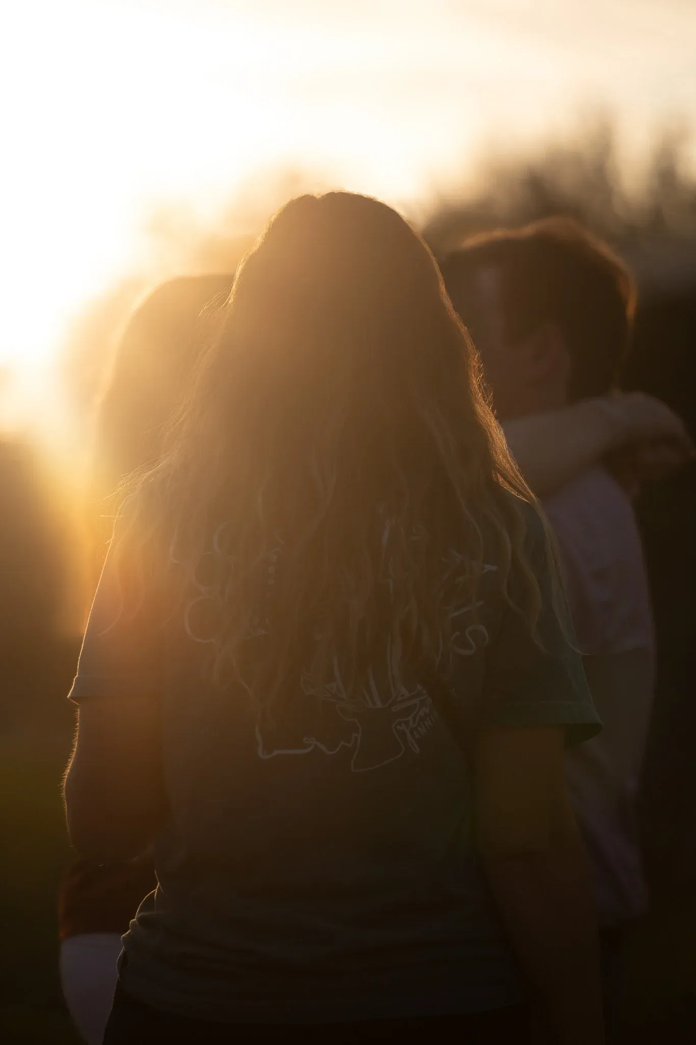 Couple together in warm backlight